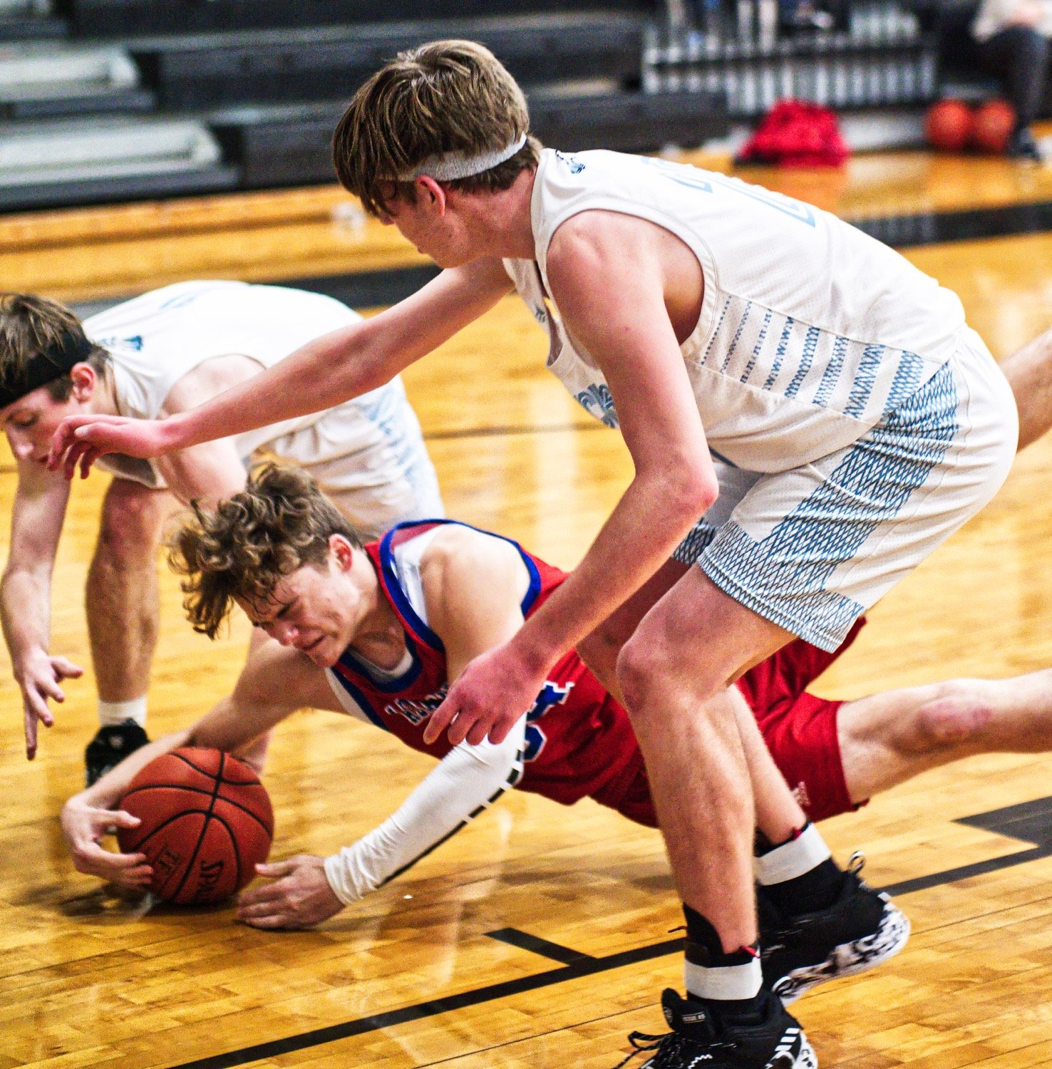 Jerry Skinner puts in the effort to successfully secure a loose ball.